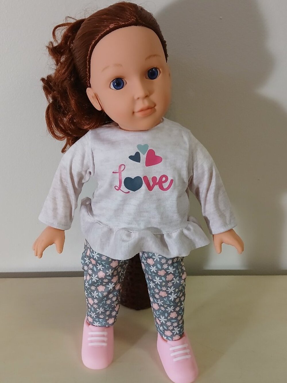 Like new Gi-Go soft body doll with red hair/blue eyes with bottle